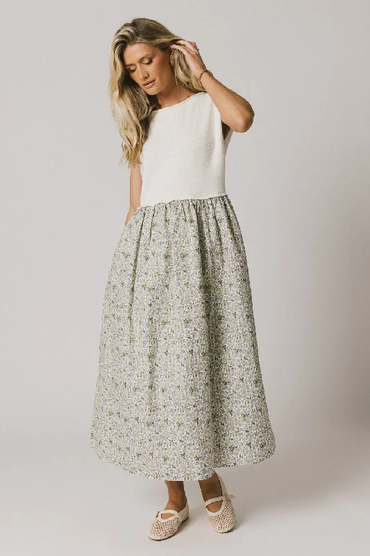 Midi dresses with pom - pom trims for a playful and festive look Celeste Floral Sweater Dress Midi dresses with pom - pom trims for a playful and festive look Celeste Floral Sweater Dress