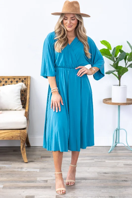 Midi dresses with patchwork patterns for a one - of - a - kind style Dusty Teal Surplice Midi Dress Midi dresses with patchwork patterns for a one - of - a - kind style Dusty Teal Surplice Midi Dress