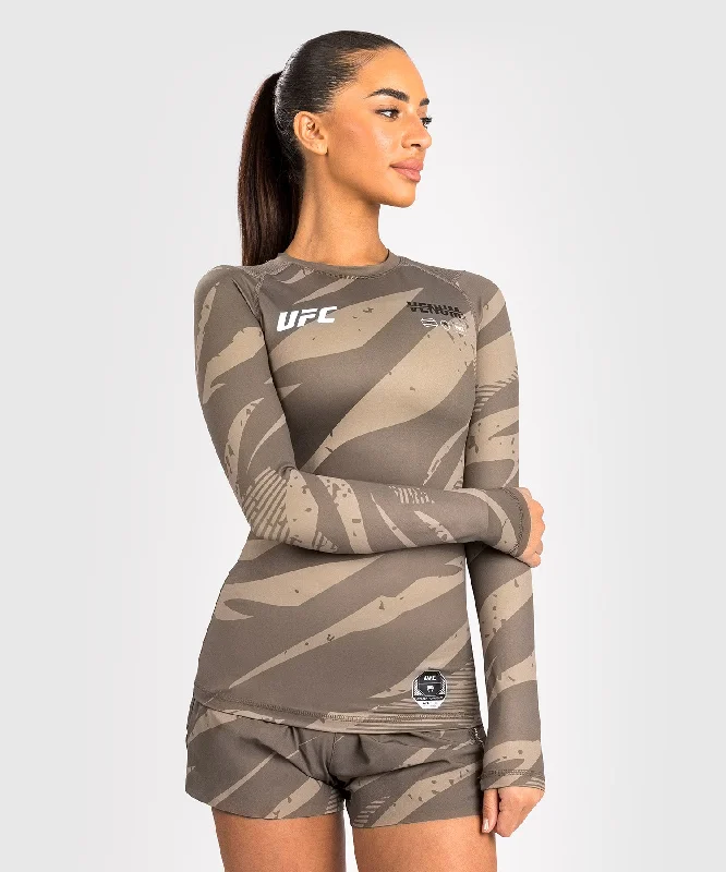 Long Sleeve Women T Shirt for Cooler WeatherUFC Adrenaline by Venum Fight Week Women’s Performance Long Sleeve Rashguard - Desert Camo Long Sleeve Women T Shirt for Cooler WeatherUFC Adrenaline by Venum Fight Week Women’s Performance Long Sleeve Rashguard - Desert Camo