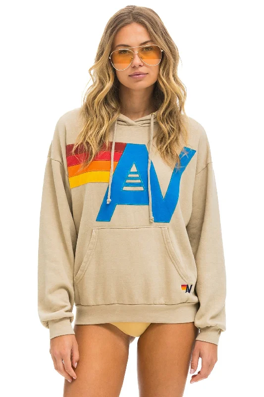 Women's color - block hoodie combining bold hues for a fashion - forward statementLOGO STITCH PULLOVER RELAXED HOODIE - SAND Women's color - block hoodie combining bold hues for a fashion - forward statementLOGO STITCH PULLOVER RELAXED HOODIE - SAND