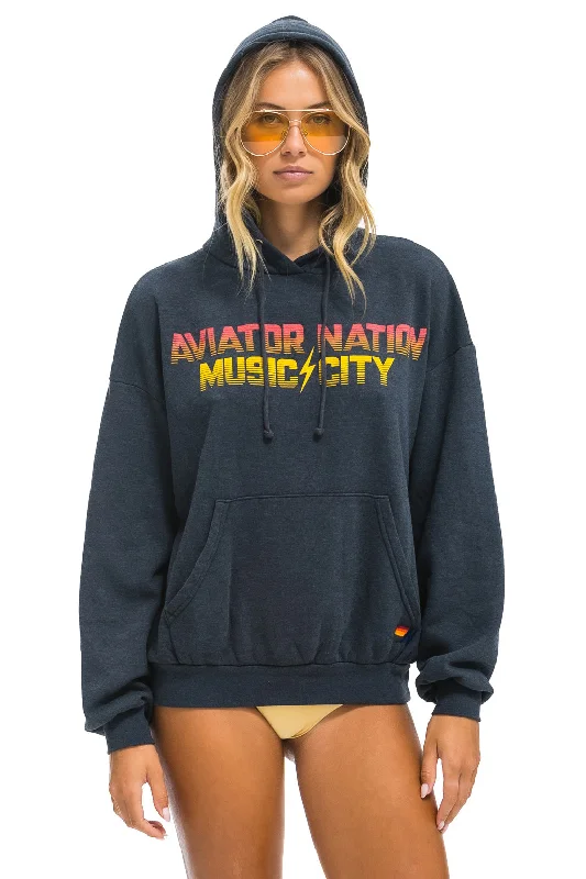 Women's tie - front hoodie in a lightweight fabric for summer layeringNASHVILLE MUSIC CITY PULLOVER HOODIE RELAXED - CHARCOAL Women's tie - front hoodie in a lightweight fabric for summer layeringNASHVILLE MUSIC CITY PULLOVER HOODIE RELAXED - CHARCOAL