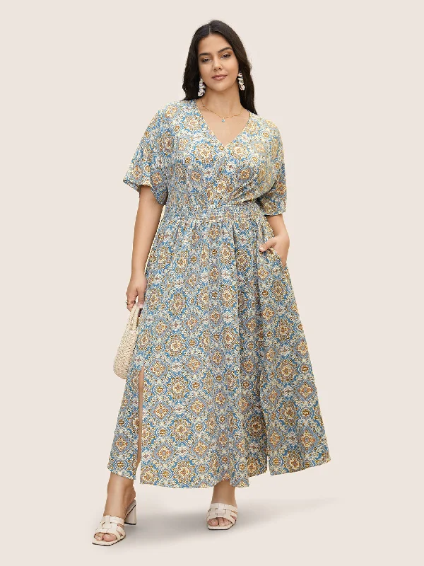 Maxi dresses with a criss - cross back for a flirty and unique detailBoho Print Shirred Pleated Maxi Dress Maxi dresses with a criss - cross back for a flirty and unique detailBoho Print Shirred Pleated Maxi Dress