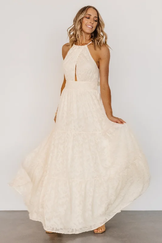 Maxi dresses with thin spaghetti straps for a delicate and feminine feelEilish Embossed Maxi Dress | Cream Maxi dresses with thin spaghetti straps for a delicate and feminine feelEilish Embossed Maxi Dress | Cream