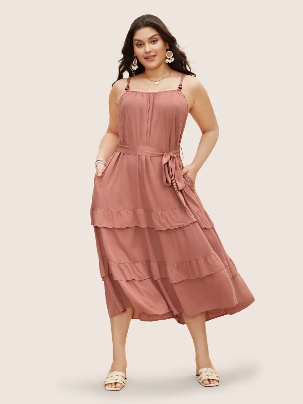 Maxi dresses with tassel accents for a fun and lively touchSolid Ruffle Layered Hem Cami Dress Maxi dresses with tassel accents for a fun and lively touchSolid Ruffle Layered Hem Cami Dress