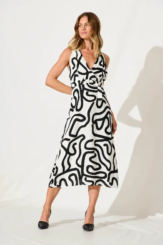 Wrap - style midi dresses in silk for a sophisticated office lookCalianna Midi Dress In White With Black Print Linen Blend Wrap - style midi dresses in silk for a sophisticated office lookCalianna Midi Dress In White With Black Print Linen Blend