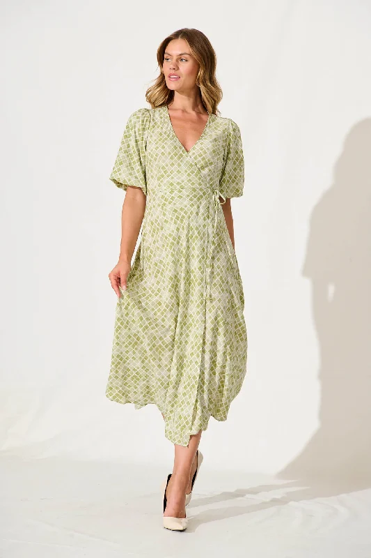 Midi dresses with belted waists to accentuate the figurePaula Midi Wrap Dress In Green Print Midi dresses with belted waists to accentuate the figurePaula Midi Wrap Dress In Green Print