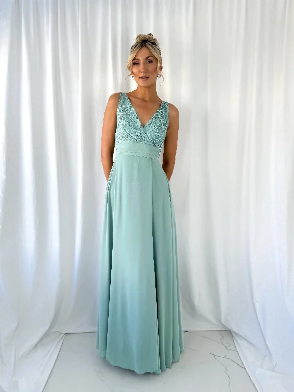 Wedding guest dresses with pom - pom trims for a playful lookDarlene Maxi Dress with Open Slit - Sage Green Wedding guest dresses with pom - pom trims for a playful lookDarlene Maxi Dress with Open Slit - Sage Green