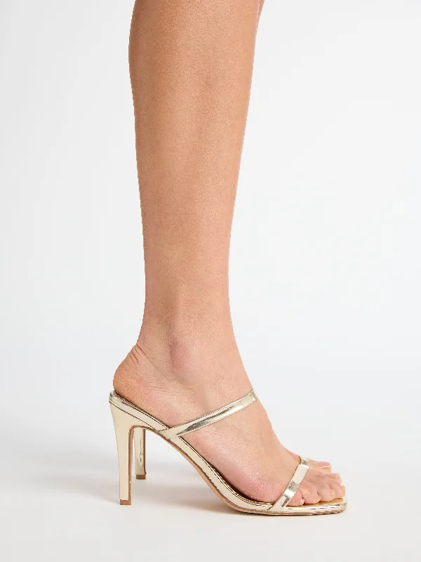 Cotton wedding guest dresses with smocked details for a casual weddingTINA HEEL