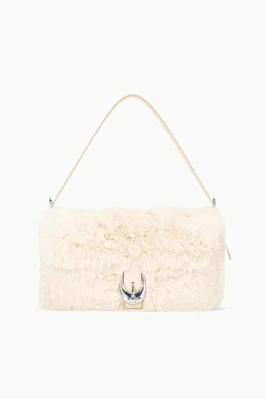 Formal dresses with fringe - trimmed sleeves and wrap - around styles for a bohemian - inspired formal eventHARLOW FAUX FUR BAG | CREAM Formal dresses with fringe - trimmed sleeves and wrap - around styles for a bohemian - inspired formal eventHARLOW FAUX FUR BAG | CREAM