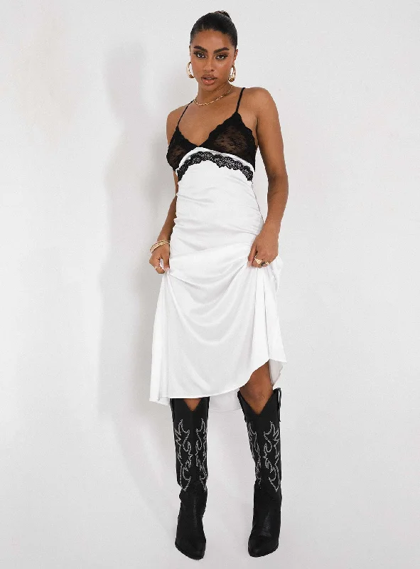 Prom dresses with tiered ruffled sleeves and satin skirts for a feminine and voluminous lookLe Paris Lace Midi Dress White Prom dresses with tiered ruffled sleeves and satin skirts for a feminine and voluminous lookLe Paris Lace Midi Dress White