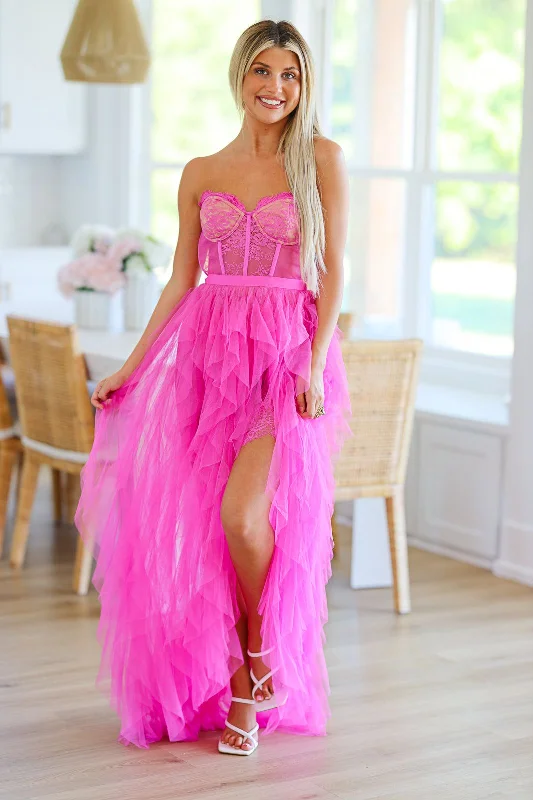 Formal dresses with cold - shoulder ruffled sleeves and floral prints for a romantic and trendy formal styleThe Bradshaw Maxi Gown Dress - Magenta Pink Formal dresses with cold - shoulder ruffled sleeves and floral prints for a romantic and trendy formal styleThe Bradshaw Maxi Gown Dress - Magenta Pink